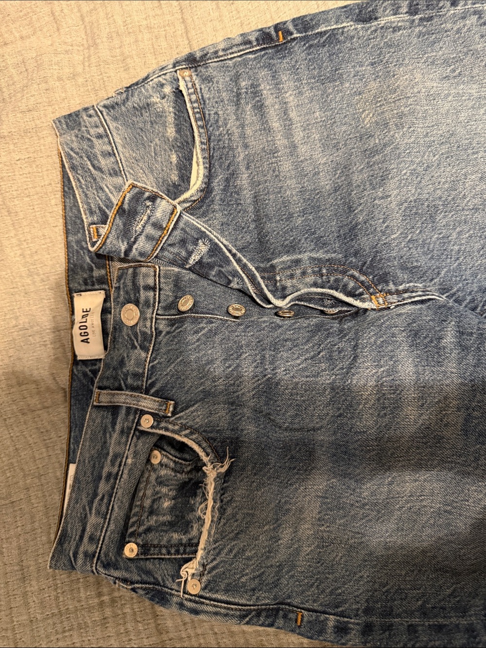 Agolde Riley 26 button fly raw hem